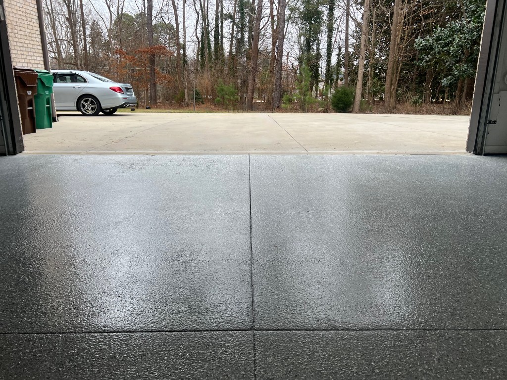 Finished residential garage with epoxy floor coating installed by Ironside Epoxy
